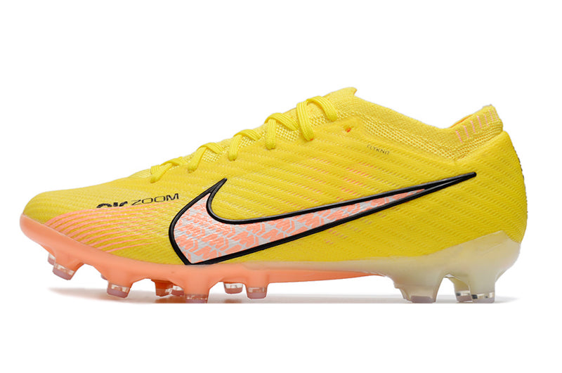 CHUTEIRA NIKE AIR ZOOM MERCURIAL VAPOR 15 ELITE CAMPO (AG) "LUCENT PACK" - AMARELA E LARANJA