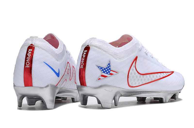 CHUTEIRA NIKE AIR ZOOM MERCURIAL VAPOR 15 ELITE CAMPO "RAPINOE" - BRANCA E VERMELHA