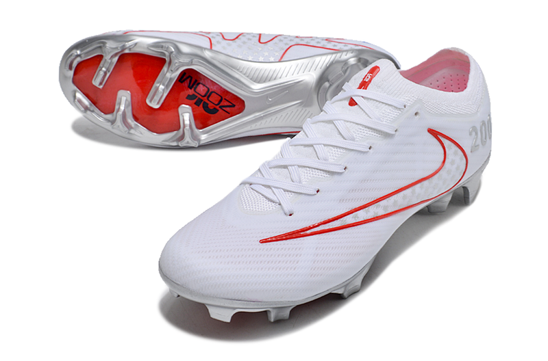 CHUTEIRA NIKE AIR ZOOM MERCURIAL VAPOR 15 ELITE CAMPO "RAPINOE" - BRANCA E VERMELHA