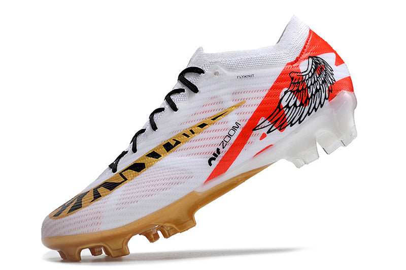 CHUTEIRA NIKE AIR ZOOM MERCURIAL VAPOR 15 ELITE CAMPO - BRANCA E DOURADA