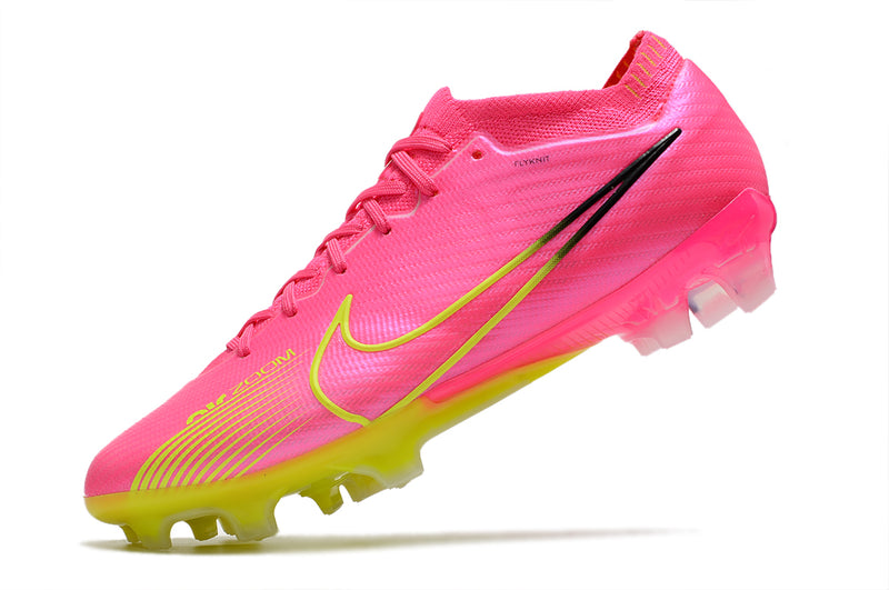 CHUTEIRA NIKE AIR ZOOM MERCURIAL VAPOR 15 ELITE CAMPO "LUMINOUS" - ROSA E AMARELO