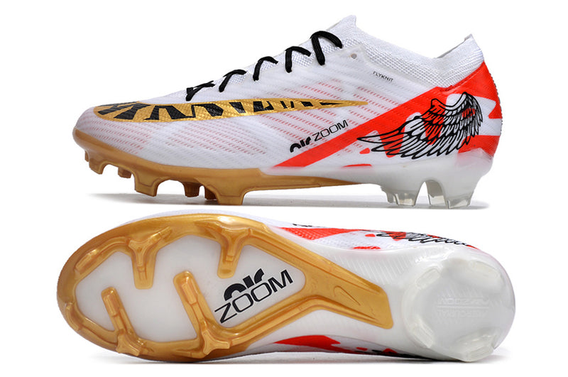 CHUTEIRA NIKE AIR ZOOM MERCURIAL VAPOR 15 ELITE CAMPO - BRANCA E DOURADA