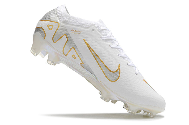 CHUTEIRA NIKE AIR ZOOM MERCURIAL VAPOR 15 ELITE CAMPO - BRANCA E DOURADA