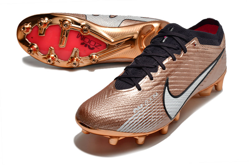 CHUTEIRA NIKE AIR ZOOM MERCURIAL VAPOR 15 ELITE CAMPO (AG) "GENERATION" - COBRE