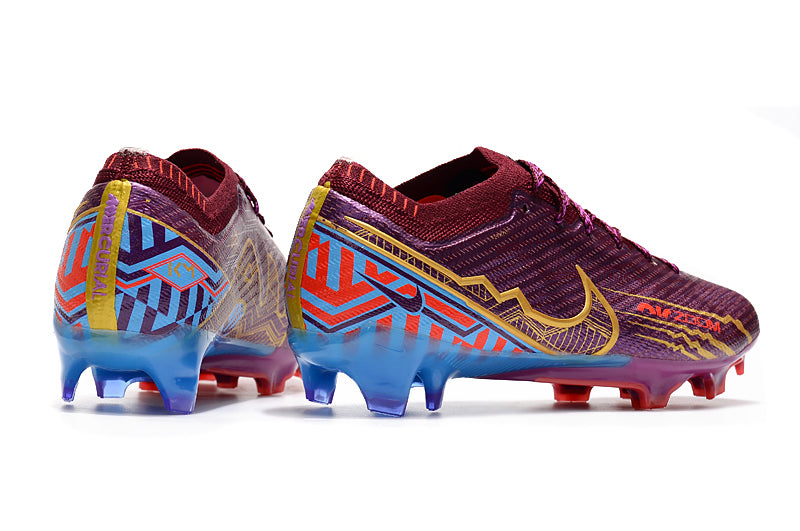 CHUTEIRA NIKE AIR ZOOM MERCURIAL VAPOR 15 ELITE CAMPO "MBAPPÉ" - VINHO
