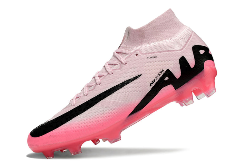 CHUTEIRA NIKE AIR ZOOM MERCURIAL SUPERFLY 9 ELITE CAMPO "MAD BRILLIANCE" - ROSA E PRETA