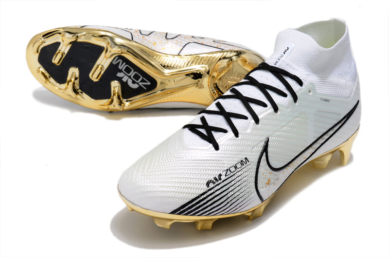 CHUTEIRA NIKE AIR ZOOM MERCURIAL SUPERFLY 9 ELITE CAMPO - BRANCA E DOURADA