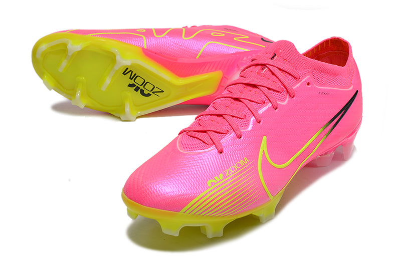 CHUTEIRA NIKE AIR ZOOM MERCURIAL VAPOR 15 ELITE CAMPO "LUMINOUS" - ROSA E AMARELO