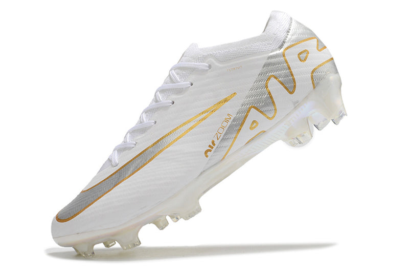 CHUTEIRA NIKE AIR ZOOM MERCURIAL VAPOR 15 ELITE CAMPO - BRANCA E DOURADA