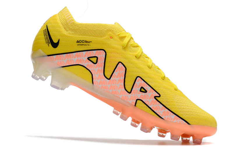 CHUTEIRA NIKE AIR ZOOM MERCURIAL VAPOR 15 ELITE CAMPO (AG) "LUCENT PACK" - AMARELA E LARANJA