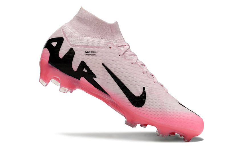 CHUTEIRA NIKE AIR ZOOM MERCURIAL SUPERFLY 9 ELITE CAMPO "MAD BRILLIANCE" - ROSA E PRETA