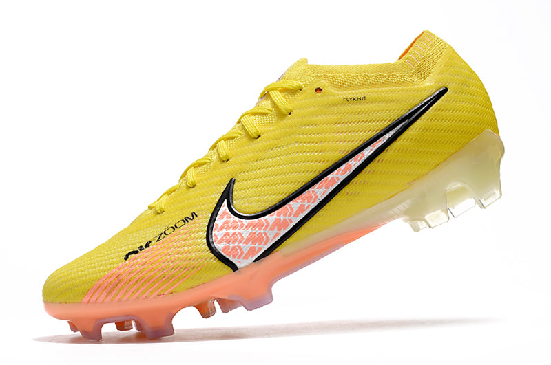 CHUTEIRA NIKE AIR ZOOM MERCURIAL VAPOR 15 ELITE CAMPO "LUCENT" - AMARELA E LARANJA