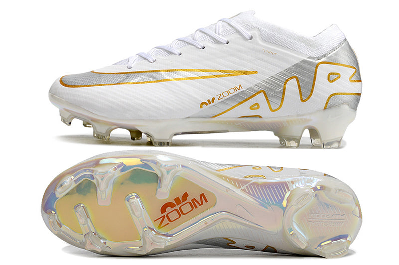 CHUTEIRA NIKE AIR ZOOM MERCURIAL VAPOR 15 ELITE CAMPO - BRANCA E DOURADA