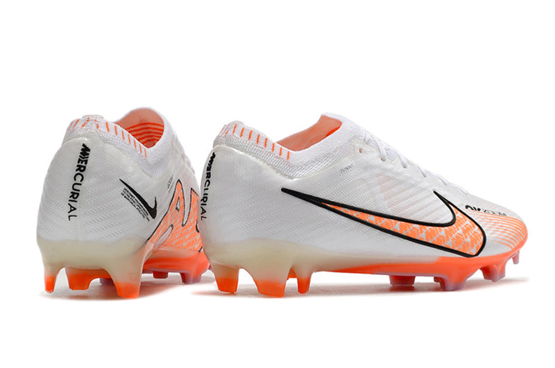 CHUTEIRA NIKE AIR ZOOM MERCURIAL VAPOR 15 ELITE CAMPO - BRANCA E LARANJA