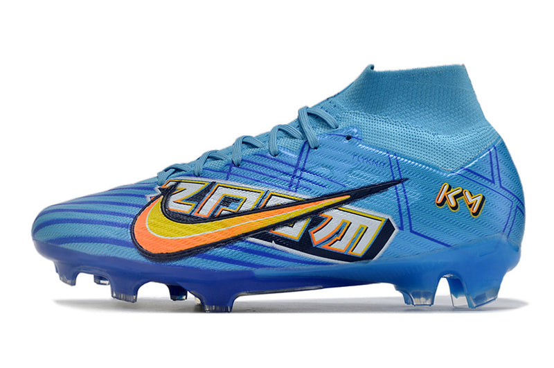 CHUTEIRA NIKE AIR ZOOM MERCURIAL SUPERFLY 9 ELITE CAMPO "MBAPPÉ COMIC" - AZUL E AMARELA