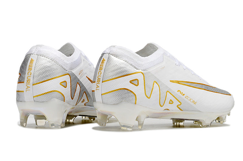 CHUTEIRA NIKE AIR ZOOM MERCURIAL VAPOR 15 ELITE CAMPO - BRANCA E DOURADA