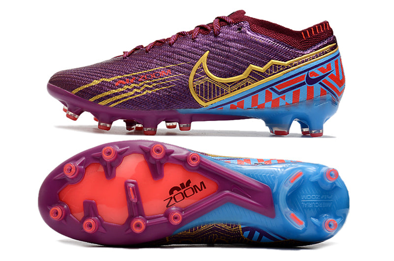 CHUTEIRA NIKE AIR ZOOM MERCURIAL VAPOR 15 ELITE CAMPO (AG) "MBAPPÉ" - VINHO E DOURADA