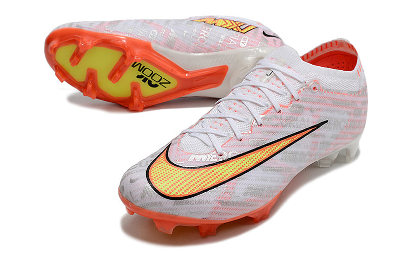 CHUTEIRA NIKE AIR ZOOM MERCURIAL VAPOR 15 ELITE CAMPO "XXV" - BRANCA E LARANJA