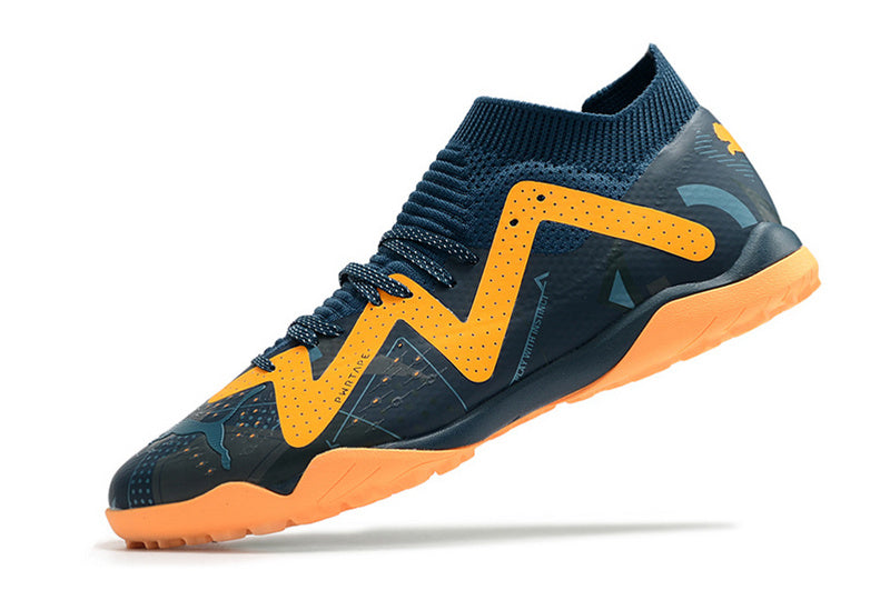 CHUTEIRA PUMA FUTURE ULTIMATE SOCIETY "DNA" - AZUL E LARANJA
