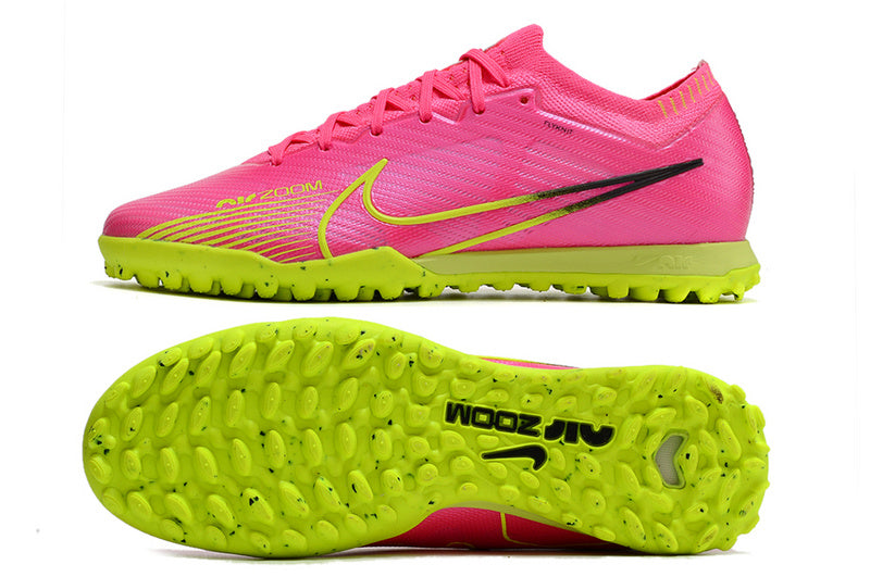 CHUTEIRA NIKE MERCURIAL AIR ZOOM VAPOR 15 ELITE SOCIETY "LUMINOUS" - ROSA E AMARELA