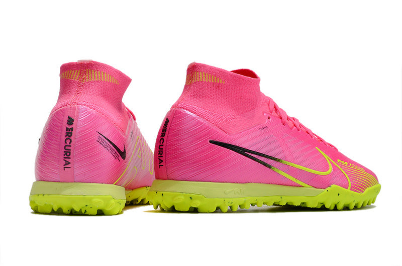 CHUTEIRA NIKE MERCURIAL AIR ZOOM SUPERFLY 9 ELITE SOCIETY "LUMINOUS" - ROSA E AMARELA