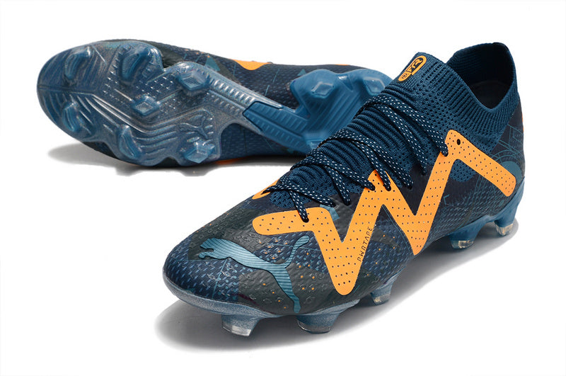 CHUTEIRA PUMA FUTURE ULTIMATE CAMPO "DNA" AZUL E AMARELA