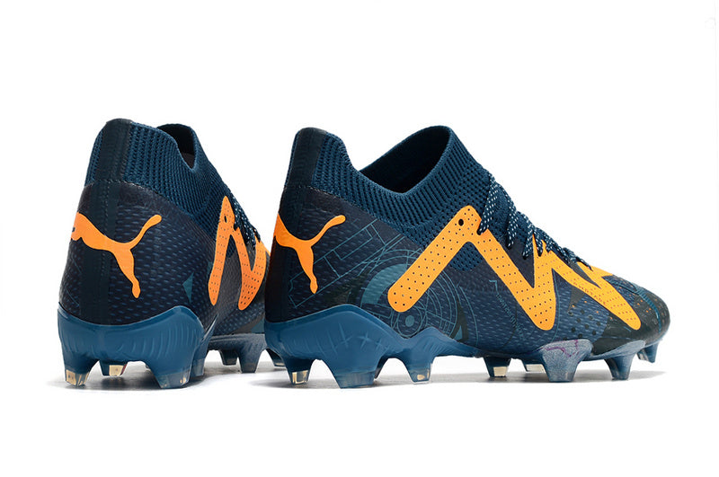 CHUTEIRA PUMA FUTURE ULTIMATE CAMPO "DNA" AZUL E AMARELA