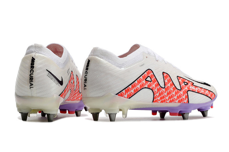 CHUTEIRA NIKE AIR ZOOM MERCURIAL VAPOR 15 ELITE TRAVA MISTA "DISRUPTION" - BRANCA E VERMELHA