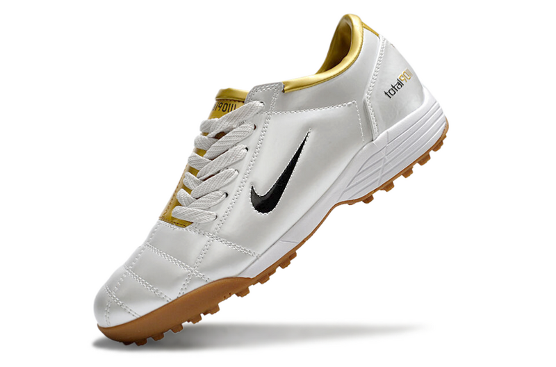 CHUTEIRA NIKE TOTAL 90 III SOCIETY - PRATA E DOURADA