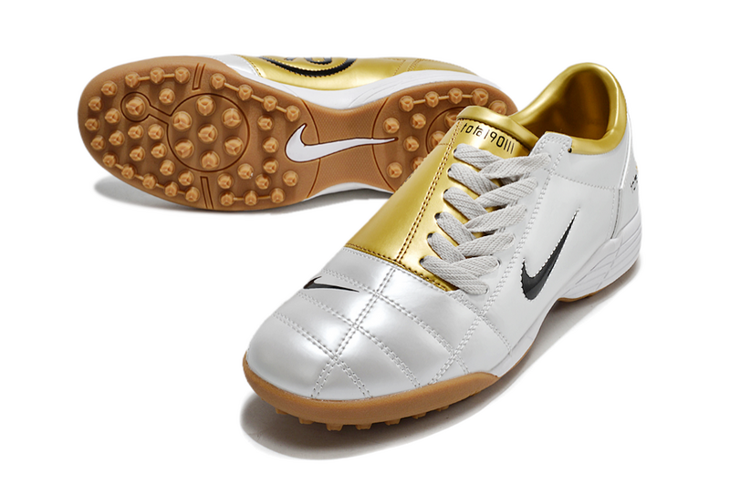 CHUTEIRA NIKE TOTAL 90 III SOCIETY - PRATA E DOURADA