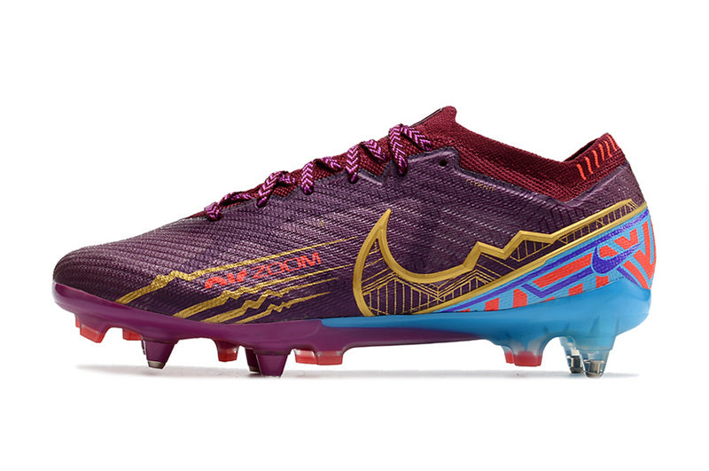 CHUTEIRA NIKE AIR ZOOM MERCURIAL VAPOR 15 ELITE TRAVA MISTA FIXA "MBAPPÉ" - VINHO