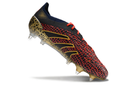 ADIDAS PREDATOR 24 ELITE TRAVA MISTA - PRETA, VERMELHA E DOURADA