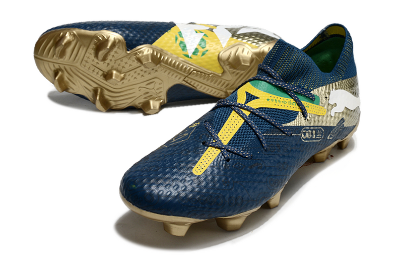 CHUTEIRA PUMA FUTURE 7 ULTIMATE CAMPO - AZUL E DOURADA