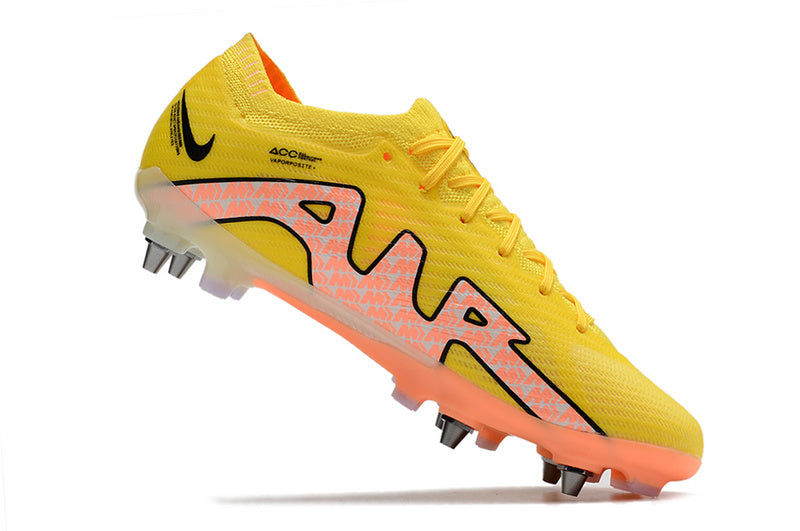CHUTEIRA NIKE AIR ZOOM MERCURIAL VAPOR 15 ELITE TRAVA MISTA "LUCENT" - AMARELA E LARANJA
