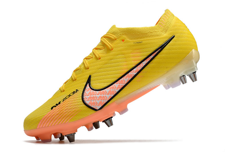 CHUTEIRA NIKE AIR ZOOM MERCURIAL VAPOR 15 ELITE TRAVA MISTA "LUCENT" - AMARELA E LARANJA