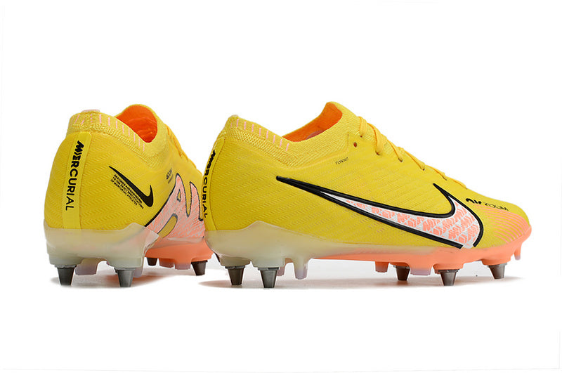 CHUTEIRA NIKE AIR ZOOM MERCURIAL VAPOR 15 ELITE TRAVA MISTA "LUCENT" - AMARELA E LARANJA