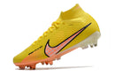 CHUTEIRA NIKE AIR ZOOM MERCURIAL SUPERFLY 9 ELITE TRAVA MISTA FIXA "LUCENT" - AMARELA E LARANJA