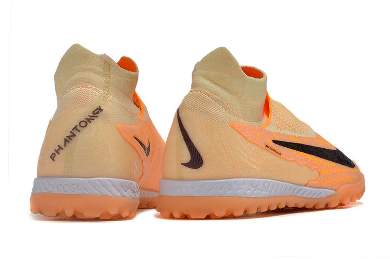 CHUTEIRA NIKE PHANTOM GX DYNAMIC FIT ELITE SOCIETY - LARANJA