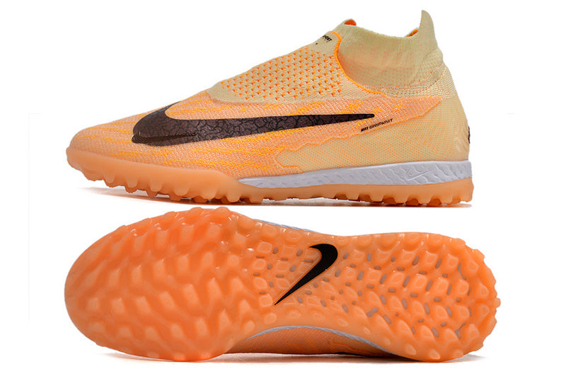 CHUTEIRA NIKE PHANTOM GX DYNAMIC FIT ELITE SOCIETY - LARANJA
