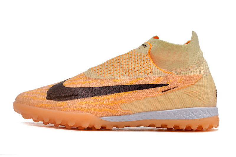 CHUTEIRA NIKE PHANTOM GX DYNAMIC FIT ELITE SOCIETY - LARANJA
