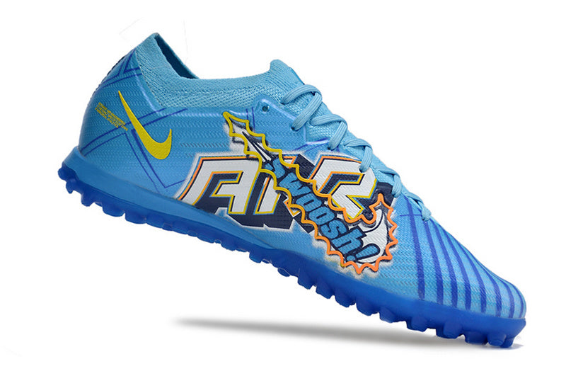 CHUTEIRA NIKE MERCURIAL AIR ZOOM VAPOR 15 ELITE SOCIETY "MBAPPÉ COMIC" - AZUL