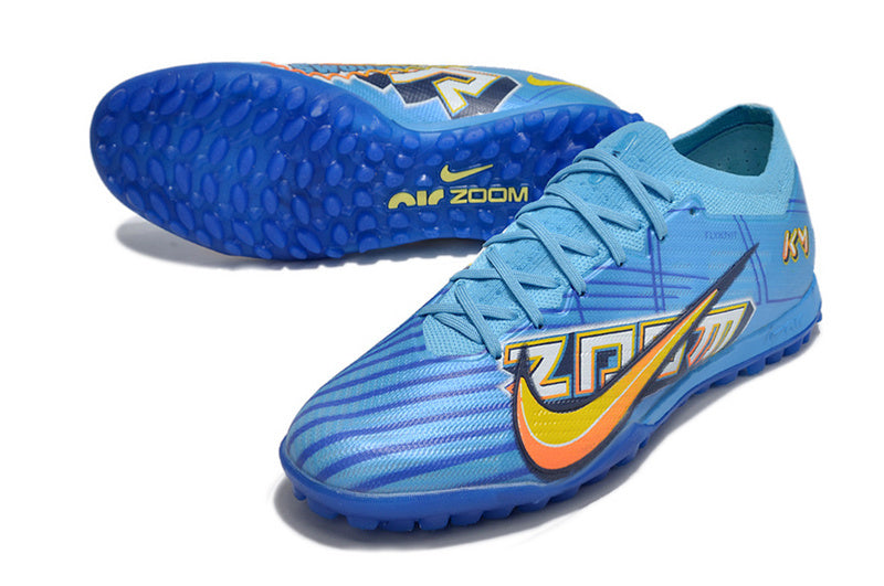 CHUTEIRA NIKE MERCURIAL AIR ZOOM VAPOR 15 ELITE SOCIETY "MBAPPÉ COMIC" - AZUL