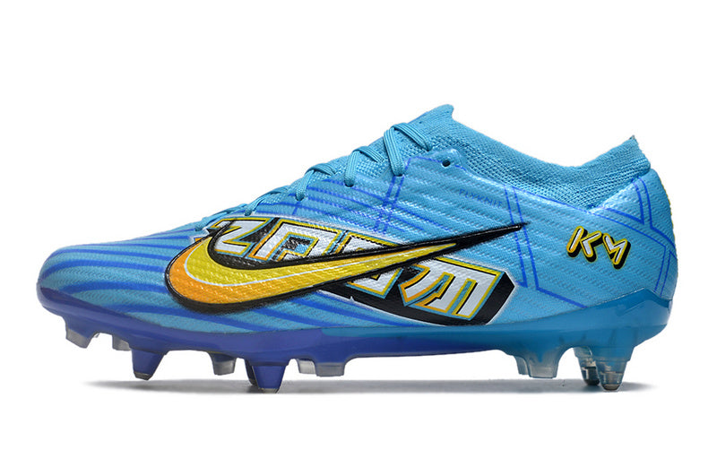 CHUTEIRA NIKE AIR ZOOM MERCURIAL VAPOR 15 ELITE TRAVA MISTA FIXA "MBAPPÉ COMIC" - AZUL E AMARELA