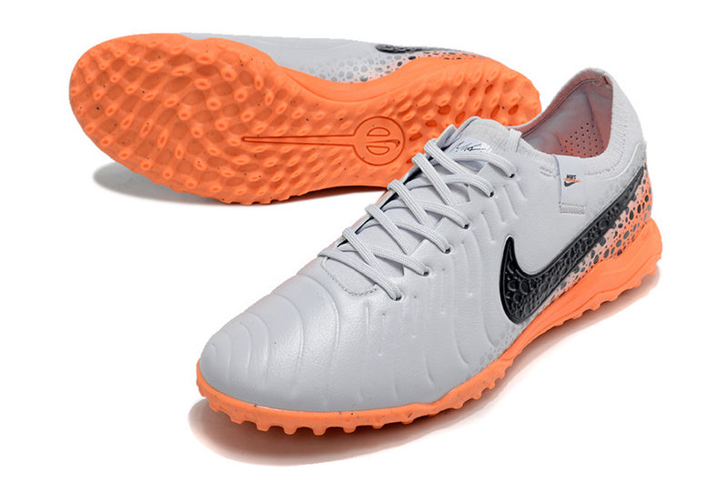 CHUTEIRA NIKE TIEMPO LEGEND 10 SOCIETY "ELECTRIC" - BRANCA E LARANJA