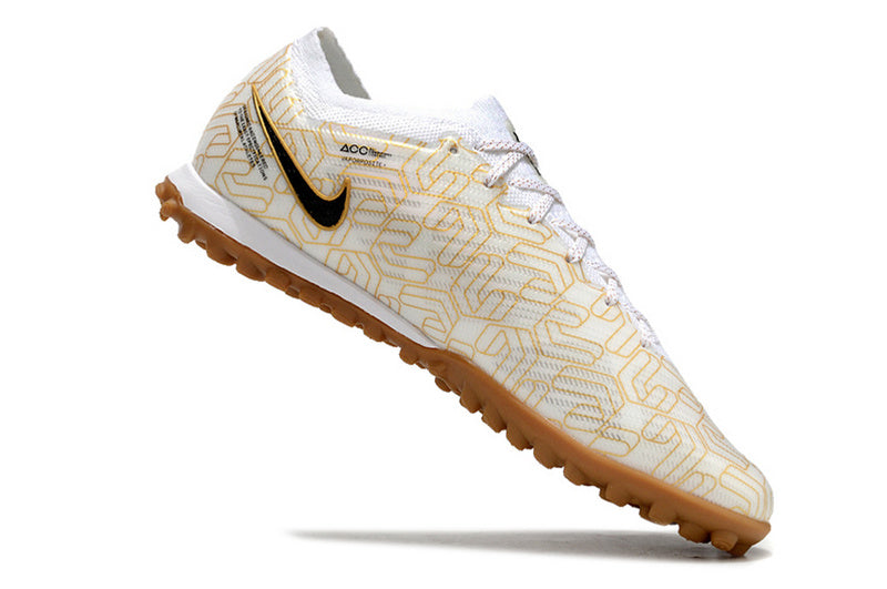 CHUTEIRA NIKE MERCURIAL AIR ZOOM VAPOR 15 ELITE SOCIETY - BRANCA E DOURADA