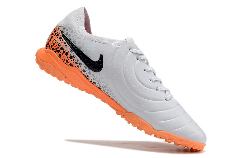 CHUTEIRA NIKE TIEMPO LEGEND 10 SOCIETY "ELECTRIC" - BRANCA E LARANJA