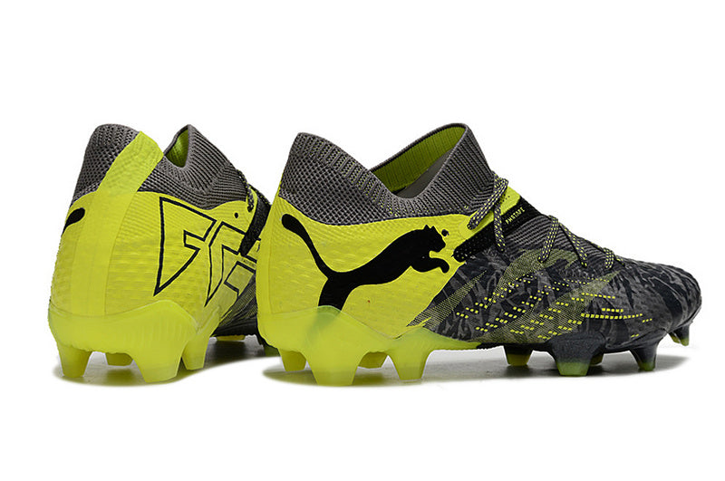 CHUTEIRA PUMA FUTURE 7 ULTIMATE CAMPO - PRETA E AMARELA