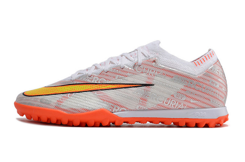 CHUTEIRA NIKE MERCURIAL AIR ZOOM VAPOR 15 ELITE SOCIETY - BRANCA E LARANJA