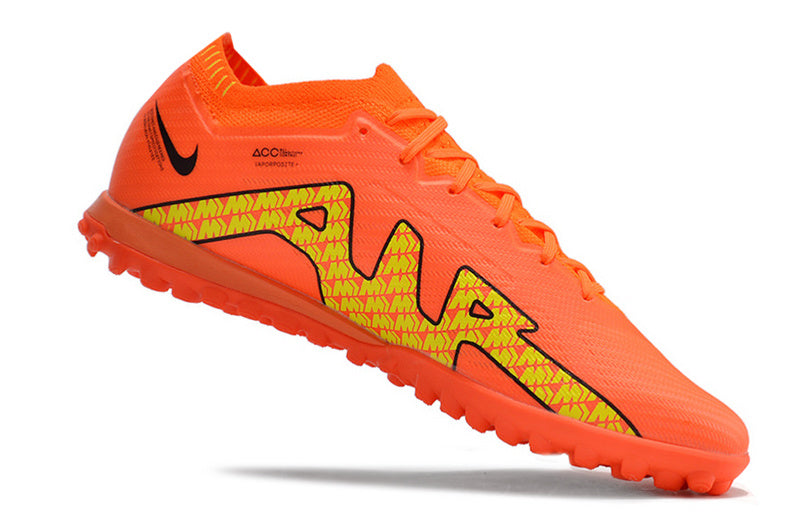 CHUTEIRA NIKE MERCURIAL AIR ZOOM VAPOR 15 ELITE SOCIETY - LARANJA