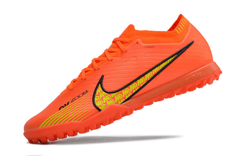 CHUTEIRA NIKE MERCURIAL AIR ZOOM VAPOR 15 ELITE SOCIETY - LARANJA